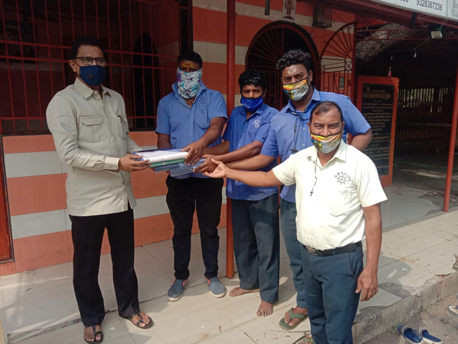 Gifted clothes to the sailors working on the boats at Gorai Jetty.