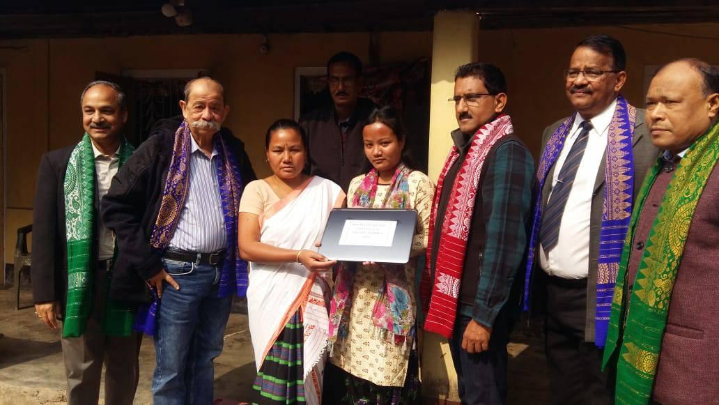 Shri Sunil Rane under the initiative of the Atharva Foundation, '100 computers 100 daughters 100 days' visited a Martyr's house located in the Kamrup District of Assam and handed a laptop to his daughter to provide her educational support.