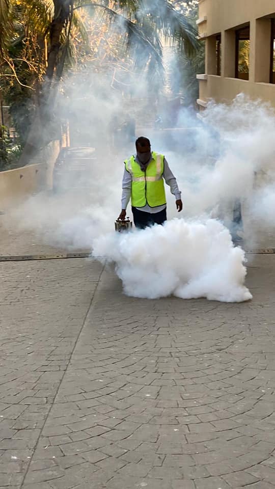 Various societies, nearby streets, fruit markets, and surrounding areas in Borivali East were disinfected with the help of a mosquito repellent smoke machine. Safety measures were taken during the process. The team is disinfecting residential areas and st