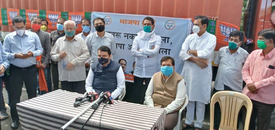 Former Chief Minister and Leader of Opposition, Shri Devendra ji Fadnavis flagged off relief material trucks sent by BJP to Konkan for people affected by #NisargaCyclone at BJP Maharashtra office along with Maharashtra BJP Sanghatan Mantri Shri. Vijay Pur